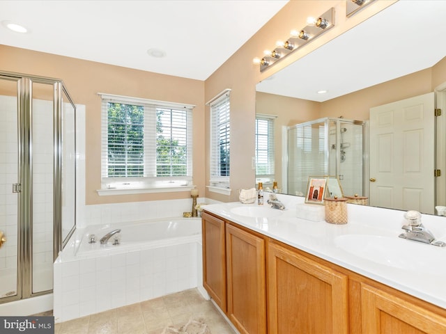 1402 Marian Way, Mount Airy, MD 21771 - bathroom featuring a stall shower, a bath, double vanity, and tile patterned floors