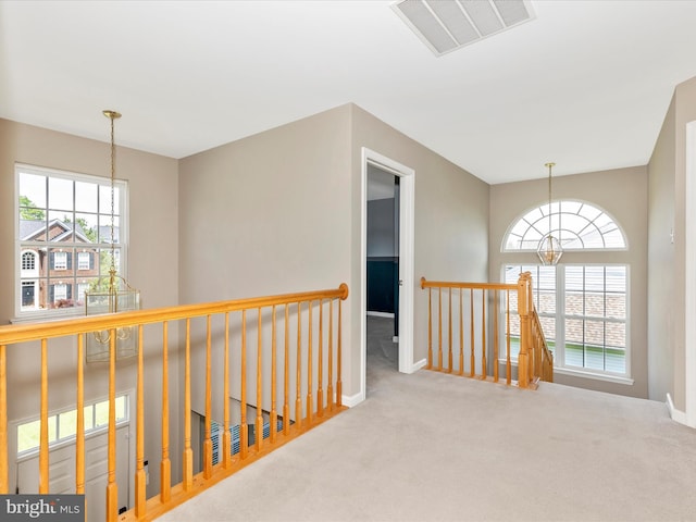 1402 Marian Way, Mount Airy, MD 21771 - corridor featuring a chandelier, an upstairs landing, and carpet