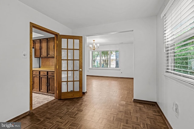 63 Lakeside Dr, Marlton, NJ 08053 - unfurnished room with a chandelier and baseboards