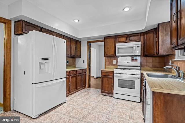 63 Lakeside Dr, Marlton, NJ 08053 - kitchen with white appliances, light countertops, decorative backsplash, and recessed lighting