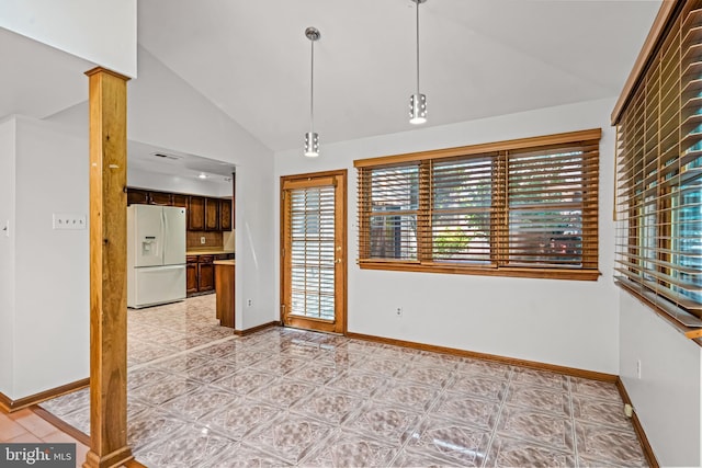 63 Lakeside Dr, Marlton, NJ 08053 - unfurnished dining area featuring vaulted ceiling, healthy amount of natural light, and light tile patterned floors