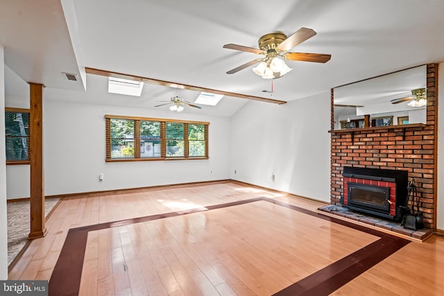63 Lakeside Dr, Marlton, NJ 08053 - unfurnished living room with hardwood / wood-style floors, ceiling fan, a skylight, and lofted ceiling