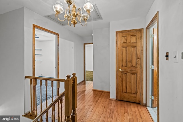 63 Lakeside Dr, Marlton, NJ 08053 - hall with an upstairs landing, a chandelier, and light wood-style floors