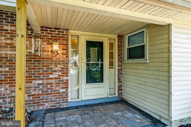 63 Lakeside Dr, Marlton, NJ 08053 - doorway to property with brick siding