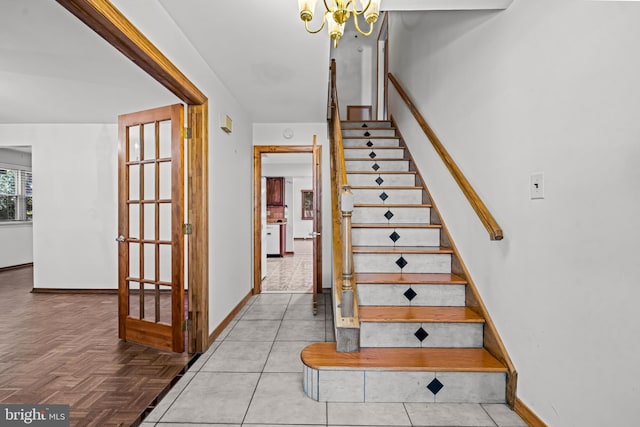 63 Lakeside Dr, Marlton, NJ 08053 - stairway featuring a chandelier and baseboards