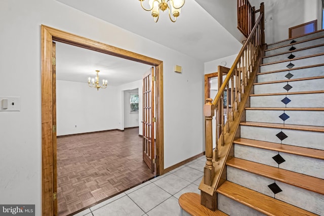63 Lakeside Dr, Marlton, NJ 08053 - stairs with a chandelier and baseboards