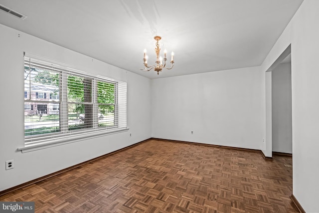 63 Lakeside Dr, Marlton, NJ 08053 - spare room with a chandelier and baseboards