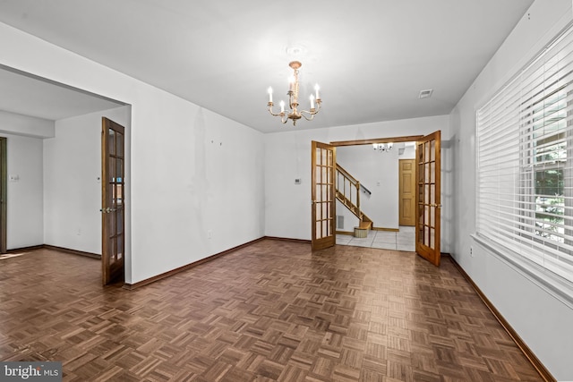 63 Lakeside Dr, Marlton, NJ 08053 - unfurnished room with a chandelier and stairway