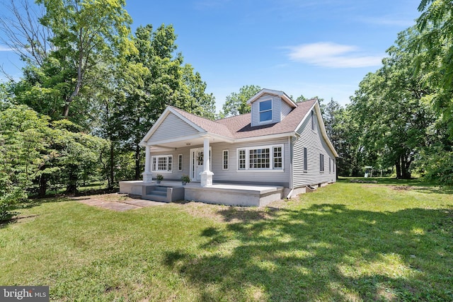 3409 Old York Rd, Furlong, PA 18925 - view of front facade with a front yard, roof with shingles, and a porch