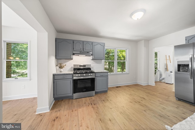 3409 Old York Rd, Furlong, PA 18925 - kitchen featuring stainless steel appliances, gray cabinetry, under cabinet range hood, and light wood-type flooring