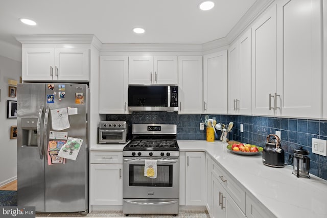 10 Crump Ln, Merchantville, NJ 08109 - kitchen featuring stainless steel appliances, white cabinetry, decorative backsplash, light stone countertops, and recessed lighting