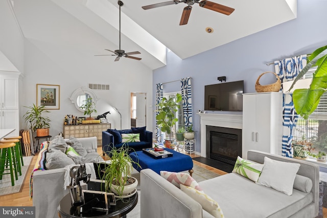 10 Crump Ln, Merchantville, NJ 08109 - living area with a ceiling fan, high vaulted ceiling, a fireplace with flush hearth, and wood finished floors