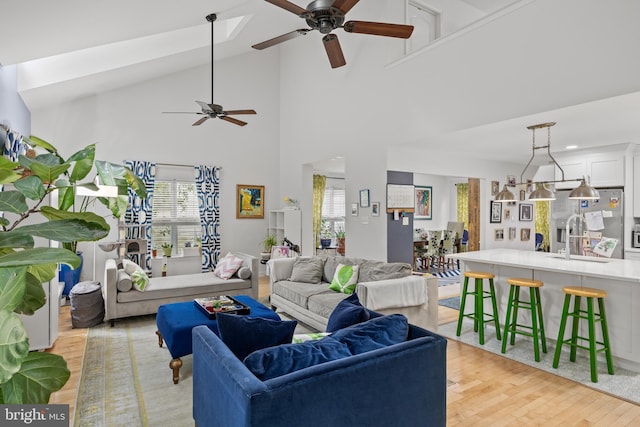 10 Crump Ln, Merchantville, NJ 08109 - living room featuring a ceiling fan, light wood finished floors, and high vaulted ceiling