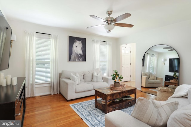 1618 Whitcomb Rd, Forked River, NJ 08731 - living area featuring ceiling fan, light wood-style flooring, and arched walkways