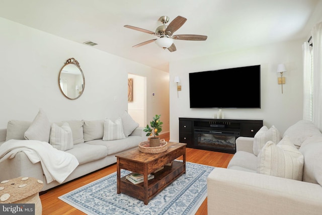 1618 Whitcomb Rd, Forked River, NJ 08731 - living room featuring a ceiling fan and light wood finished floors