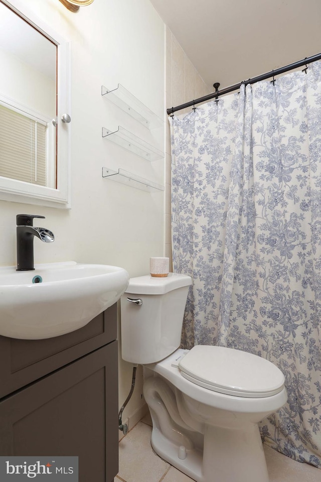 1618 Whitcomb Rd, Forked River, NJ 08731 - full bath with vanity, tile patterned floors, and a shower with shower curtain