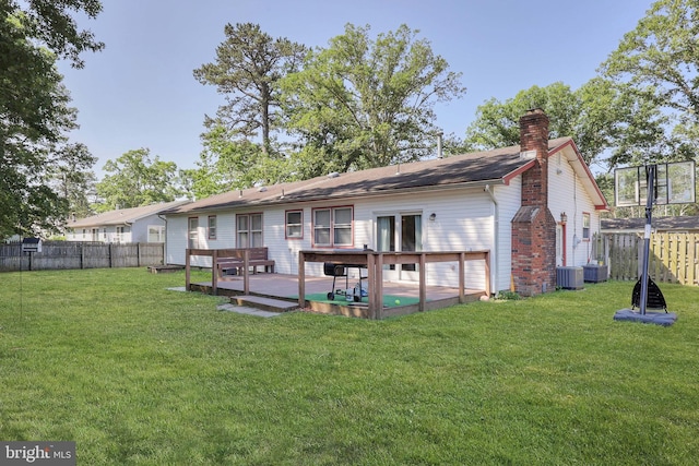 1618 Whitcomb Rd, Forked River, NJ 08731 - rear view of house with a chimney, a fenced backyard, and a wooden deck