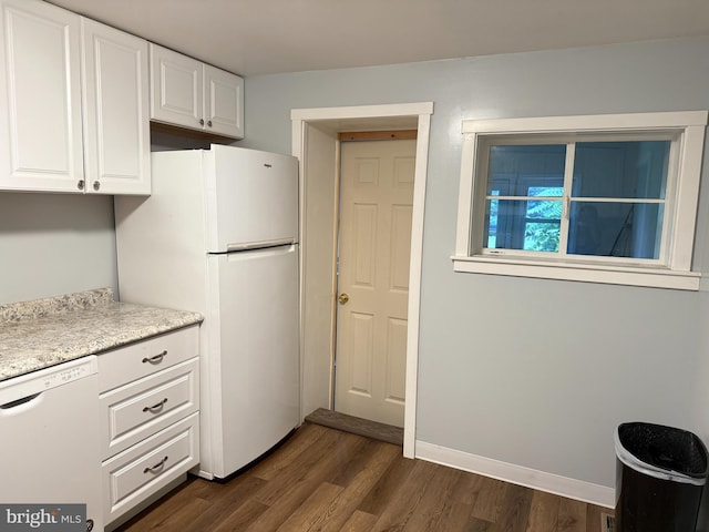1505 London Ave, Wilmington, DE 19808 - kitchen featuring white appliances, white cabinetry, and dark wood-style floors