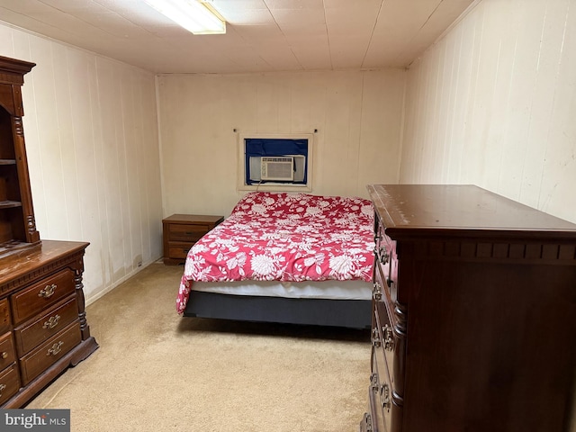 1505 London Ave, Wilmington, DE 19808 - bedroom featuring light carpet, cooling unit, and wooden walls
