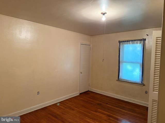 1505 London Ave, Wilmington, DE 19808 - spare room with dark wood-type flooring