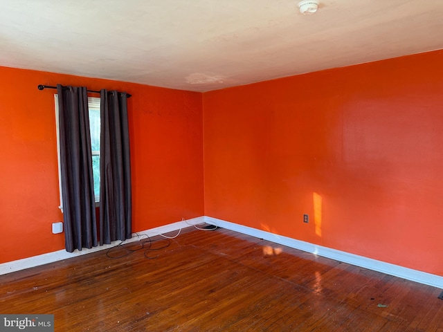 1505 London Ave, Wilmington, DE 19808 - empty room featuring a smoke detector and hardwood / wood-style floors