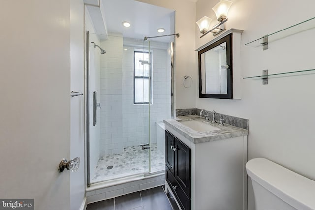1 Scott Cir NW Unit 305, Washington, DC 20036 - full bath with vanity, a stall shower, tile patterned flooring, and recessed lighting