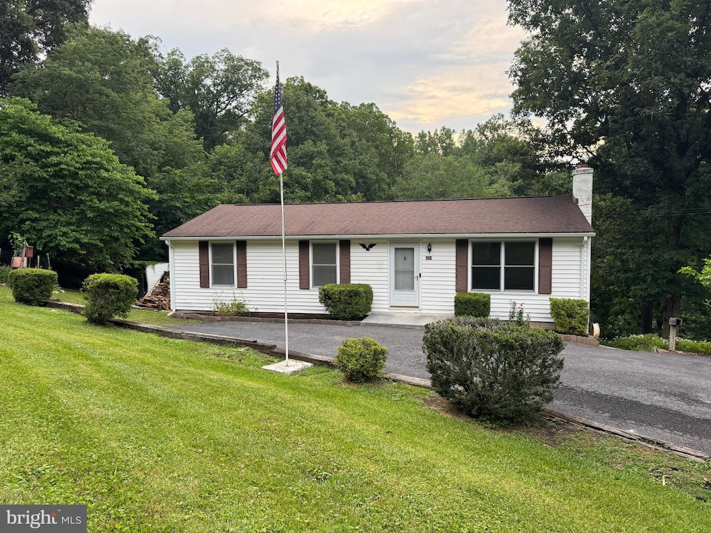235 Apple Way, Front Royal, VA 22630 - ranch-style home with a front lawn and a chimney