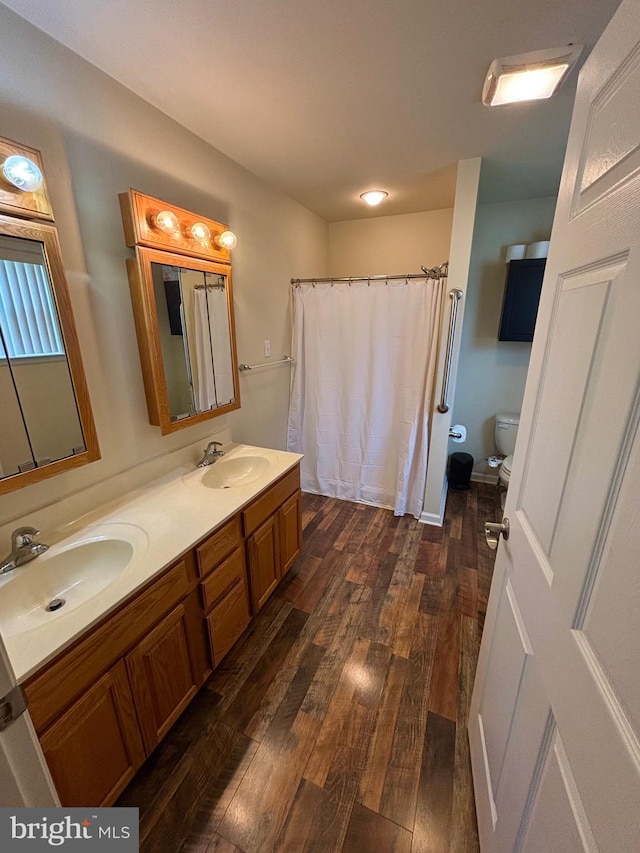 56 Reprisal Rd, Inwood, WV 25428 - full bathroom with hardwood / wood-style flooring, double vanity, and curtained shower