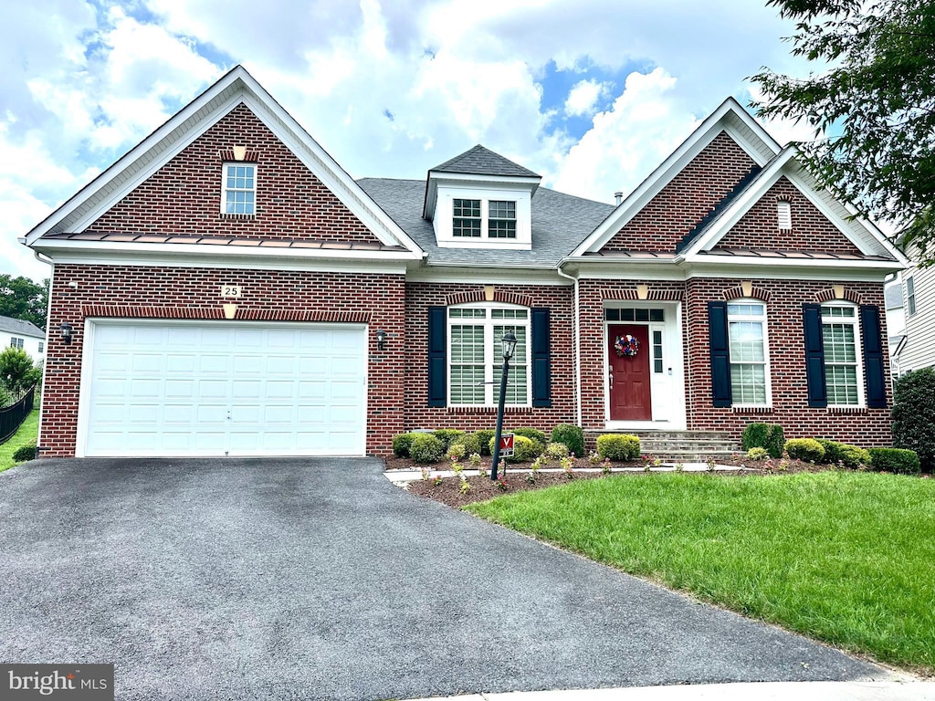 25 Moonlight Trail Ct, Silver Spring, MD 20906 - view of front facade with asphalt driveway, a front lawn, brick siding, and a garage