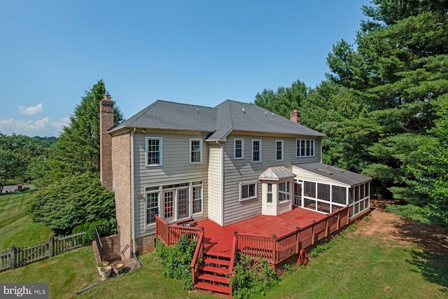 10009 Thompson Ridge Ct, Great Falls, VA 22066 - rear view of property with a chimney, a sunroom, and a wooden deck