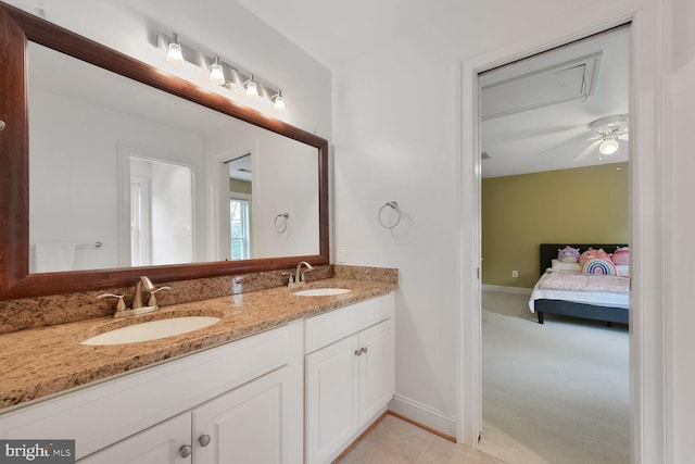 10009 Thompson Ridge Ct, Great Falls, VA 22066 - ensuite bathroom featuring double vanity and tile patterned flooring