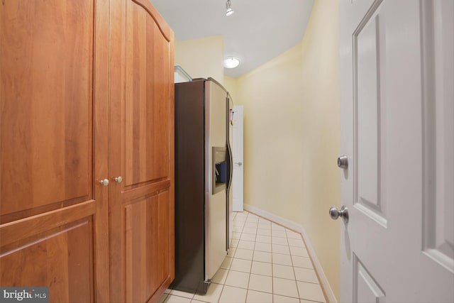 10009 Thompson Ridge Ct, Great Falls, VA 22066 - hallway with light tile patterned flooring and baseboards