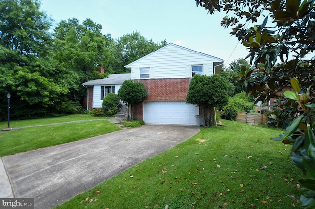2016 Cascade Rd, Silver Spring, MD 20902 - tri-level home featuring brick siding, a garage, concrete driveway, and a front lawn