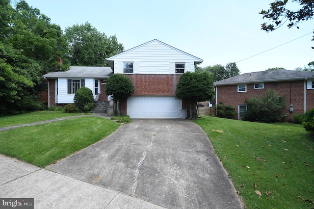 2016 Cascade Rd, Silver Spring, MD 20902 - tri-level home featuring brick siding, an attached garage, driveway, and a front lawn