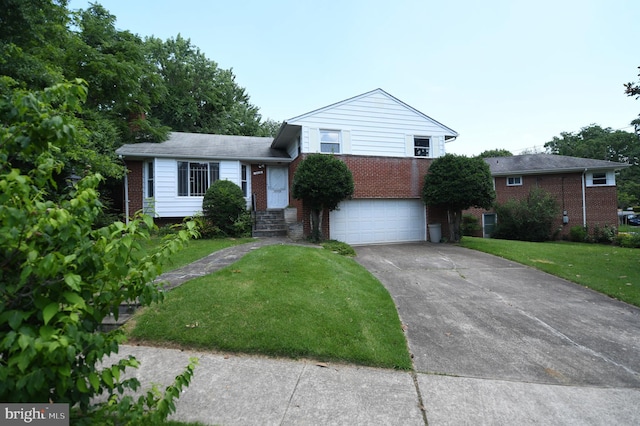 2016 Cascade Rd, Silver Spring, MD 20902 - tri-level home featuring brick siding, driveway, an attached garage, and a front lawn