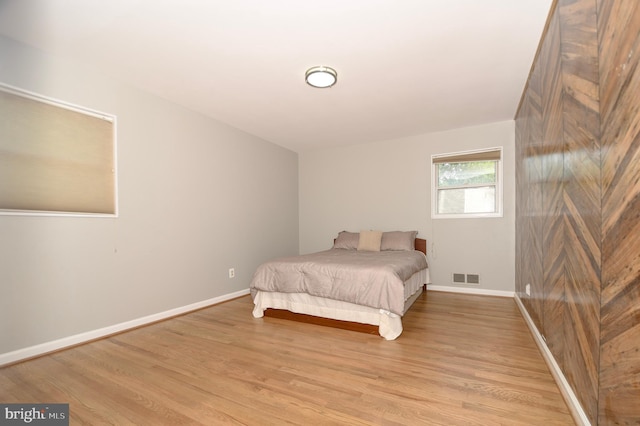 2016 Cascade Rd, Silver Spring, MD 20902 - bedroom with light wood-style flooring and baseboards