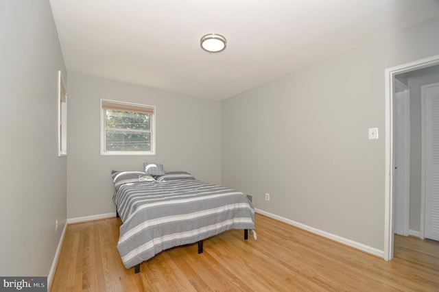 2016 Cascade Rd, Silver Spring, MD 20902 - bedroom featuring light wood-type flooring and baseboards