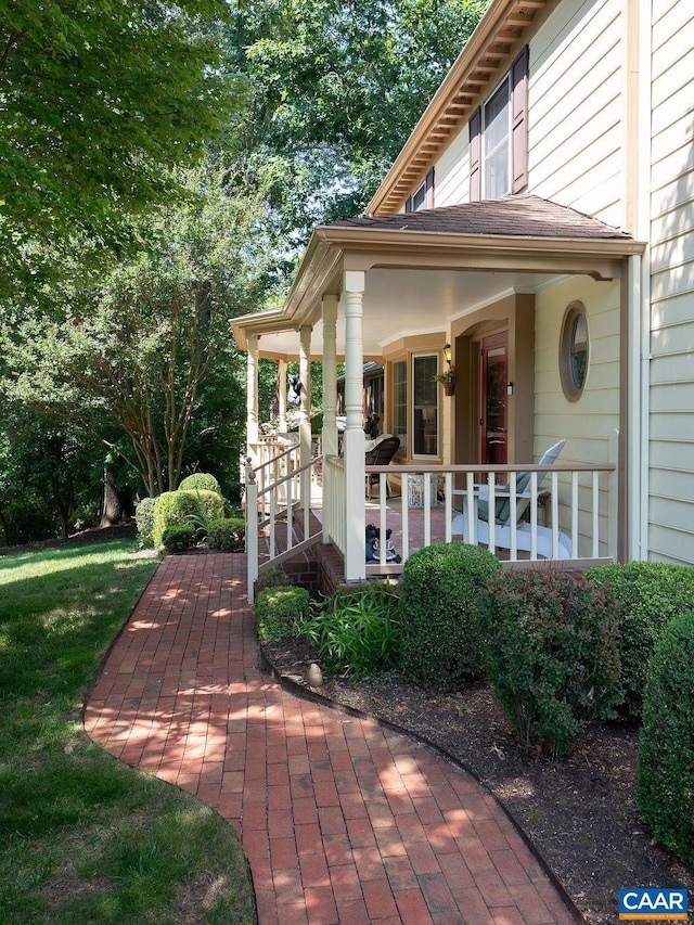 1754 Hearthglow Ln, Charlottesville, VA 22901 - entrance to property featuring a porch and a lawn