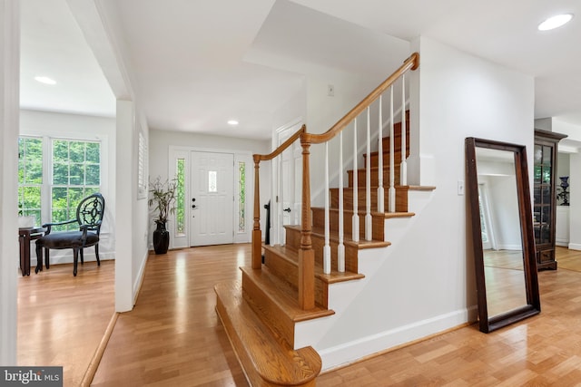 10418 Adel Rd, Oakton, VA 22124 - foyer entrance featuring light wood-type flooring, recessed lighting, and stairway