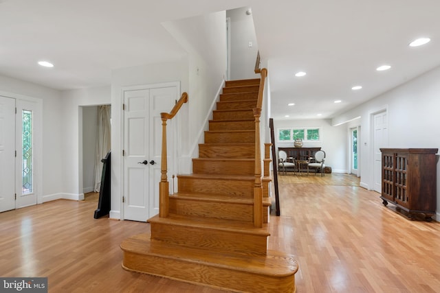 10418 Adel Rd, Oakton, VA 22124 - staircase featuring healthy amount of natural light, wood finished floors, and recessed lighting