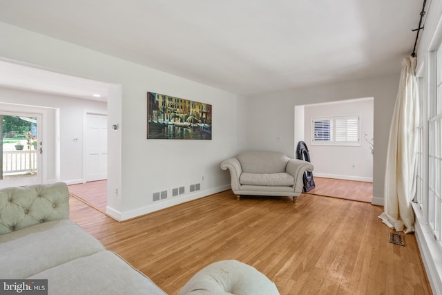 10418 Adel Rd, Oakton, VA 22124 - living room featuring light wood-type flooring and baseboards