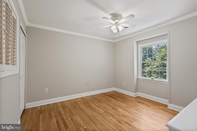 10418 Adel Rd, Oakton, VA 22124 - unfurnished bedroom with light wood-style floors, ornamental molding, and ceiling fan