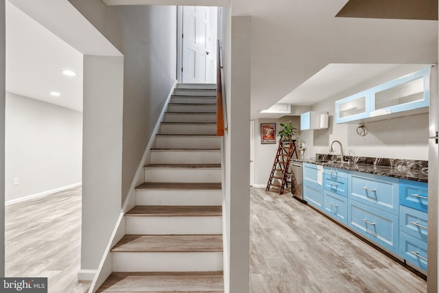 10418 Adel Rd, Oakton, VA 22124 - stairs with wood finished floors and recessed lighting