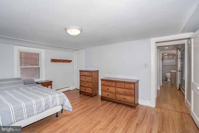 332 Old Stone House Rd S, Boiling Springs, PA 17007 - bedroom featuring a baseboard radiator, baseboard heating, and light wood-type flooring