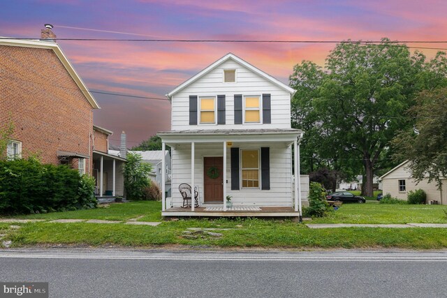 332 Old Stone House Rd S, Boiling Springs, PA 17007 - view of front of house featuring a porch and a front lawn