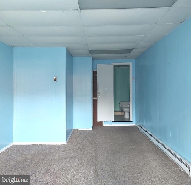 396 Cypress St, Millington, MD 21651 - unfurnished room featuring a paneled ceiling, baseboard heating, and carpet