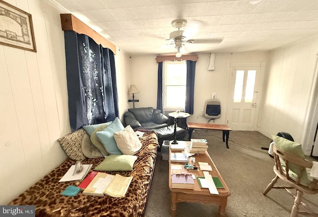 396 Cypress St, Millington, MD 21651 - carpeted living room with ceiling fan and wooden walls