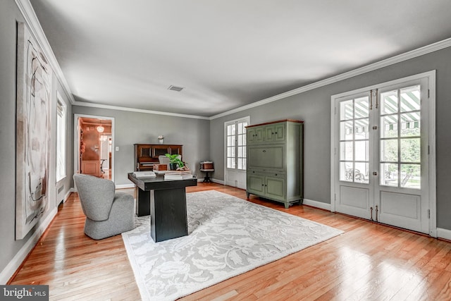 606 E Seminary Ave, Baltimore, MD 21286 - living area with french doors, light wood-style floors, and crown molding