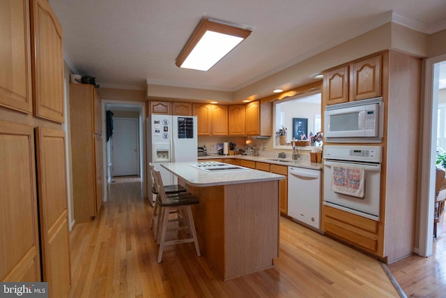 744 Pontzer Rd, Strasburg, VA 22657 - kitchen with white appliances, a kitchen island, light countertops, light wood-style flooring, and crown molding