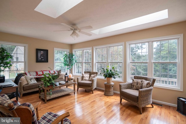 744 Pontzer Rd, Strasburg, VA 22657 - living area with a skylight, healthy amount of natural light, light wood finished floors, and a ceiling fan